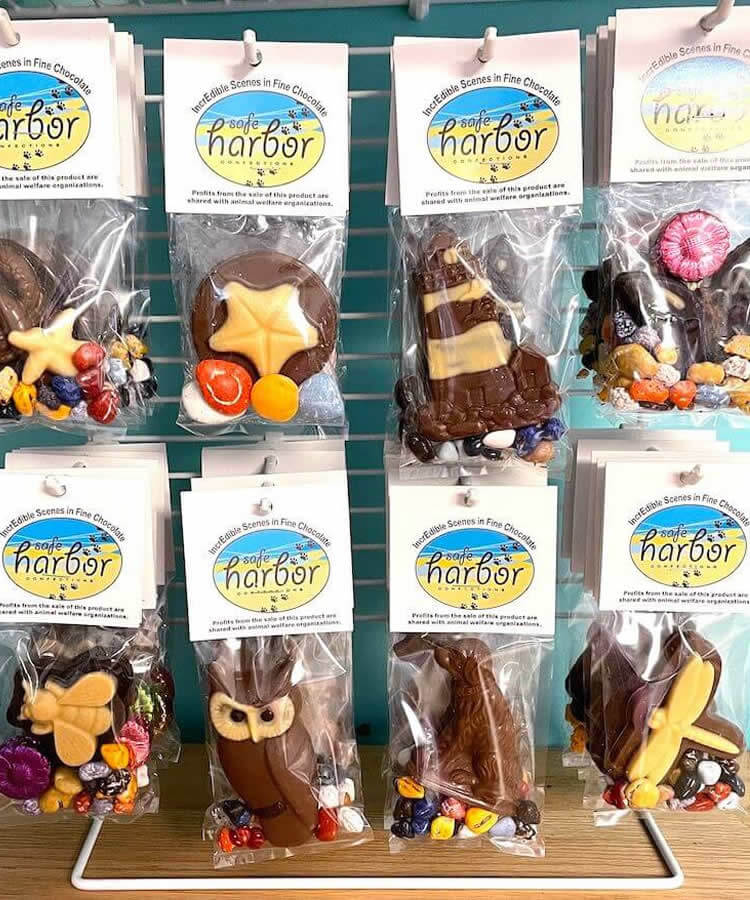 Chocolate novelty scenes on a display rack.